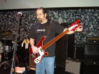 Joey tuning up his stunning Ruby Fretless