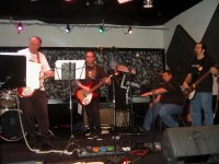 Rich, Dan and Joey with the ProgKnowSys guitarist trying out the keyboards