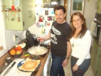Paul A. stirring up the Waffle batter in Dalia's kitchen