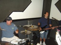 Paul S on drums and vocals; Joey da Bassman