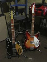 Rich's two 21-fret Rics on display .... the JetGlo 660-12 and the FireGlo V64 with Ac'cent Vibrato tailpiece added (Thanks to Craig Witty)
