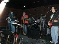 Steve on guitar (left) and Jim Hitch, Tony S and Joey share the vocals