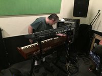 Keyboardist John F getting his gear set up