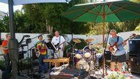 John on keys, Gary on the BurgundyGlo 460, Rich on the JetGlo 370 WB, (in front of them is the Rickenbacker CW-8  Console Steel), Al on the Drums and Mark F on the V63 Bass