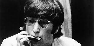 Lennon sucking and blowing.jpg