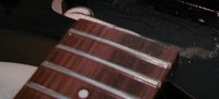 450v63 JG fretboard; the wood has very little red to it