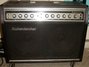 Rickenbacker TR100/amp , Black: Headstock