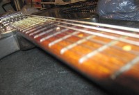 Scorched finger board
