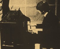 JOHN AT THE HARMONIUM
