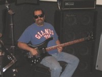 The Maestro relaxing with his set-neck Bass