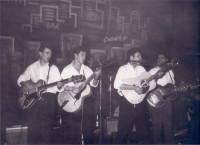 The Jets at The Top Ten Club, Hamburg, July 1960.<br />The front line left to right: Pete Wharton (bass), Colin Melander (guitar), Tony Sheridan (guitar), Rick Hardy (guitar)