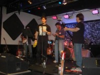 Paul with tambourine, Gary and Dane