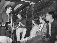 The girl to the left, who appears to be in an eye lock with Paul,<br />is the future Mrs. John Lennon, Cynthia Powell.
