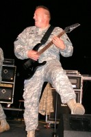 burger3.JPG (114.45 KiB) Viewed 854 times Staff Sgt. Eric Burger, the chief of the resource management and logistics division and detachment leader for the 76th Army Band, rocks out with his guitar at a recent event. In addition to writing and arranging the new 21st Theater Sustainment Command March, Burger has also shared the stage with legends such as Frank Sinatra, Ella Fitzgerald and the Blues Brothers.