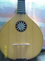 Rosette is made of pieces of ebony and legal ivory
