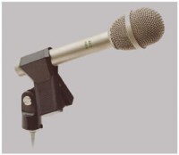 Made from the late 60's through the mid 80,s, the original<br />AKG C-451 C Condenser Modular System (CMS Series) was<br />a best-selling chameleon of a mic. It was designed to be<br />adaptable to nearly any purpose; it could be outfitted with<br />any of a whole system of modular components such as<br />screw-on capsule attenuator pads, extension tubes and<br />swivels that greatly increased its versatility. The original<br />mic used the N-46E dual-AC power supply that supplied<br />12-volt phantom power and had a two-position, bass roll-off<br />filter switch. The mic would accept up to 52-volt phantom<br />powering without smoking. The original, externally biased<br />CK-1 capsule had an extremely low mass, making the mic<br />insensitive to handling noise and a favorite for hand-held<br />radio and TV use.