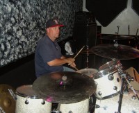 Paul S doing a fine job on the drum kit