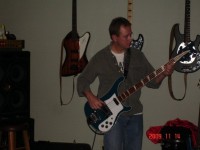 Their regular bass player Tom - first time to ever hold or play a Rick bass.
