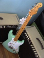 guitar full shot with brown face blonde amps upright angle compressed.jpg