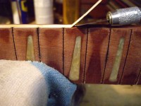 Removing the fingerboard binding