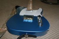 '09 MIM Standard Tele, LPB.  I put a Wilkinson compensated saddle bridge on.