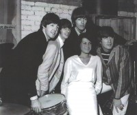 Another rare photograph, this time of The Beatles back stage at The Globe with an unnamed fan. This photograph was not taken on the fateful night in 1963 but almost a year later in October 1964.