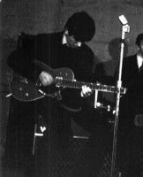 1963: Gretsch 6131 Jet Fire Bird (single cutaway, red w/ black pickguard, vintage '58-'62): Harrison probably borrowed this guitar -- essentially another version of the Duo Jet -- and used it briefly early in the year.  It's seen in photos from a Cavern Club rehearsal, but precious little after that.