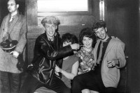The man in the leather jacket is Alan Caldwell, roadie for the band and some time performer.........