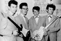 Here we see "Ringo Starr and All-Starr Band" waiting as roadie Alan Caldwell set up.