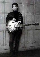 "Quick, take a picture of me with Joe's guitar before he gets back"