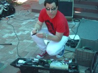 Paulie setting up his pedal board -- check out the patriotic footwear colors !!