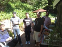 L to R  Kira's next door neighbor sitting, Gabriel who sat in on  drums, Paul A., Woody and John A.   (Dalia behind Woody putting some food on the serving table)