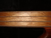 Possibly a ziricote fingerboard?