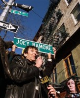 Joey Ramone's mother, Charlotte Lesher with the sign in 2003