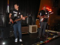 Paulie tries some Bass during the Surf set with Dave T doing the guitar solo