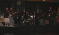 "Jumping Jack Flash" with Jake doing the Mick Jagger Front Man routine.  Skip, Collin on drums, Paul's brother  on the P-Bass and Rich