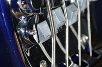 The saddle grooves are so shallow they barely hold the heavier strings in place.