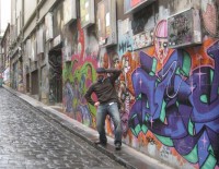 Graham with grafitti walls.jpg