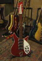 Kira's spectacular 320 Ruby refinished by Paul W and Kira did the fantastic Checkered binding work, including the headstock.  This picture does not do it justuce.... it is ten times more beautiful in person.  This surely won the "Best of Show" category.  It is cool !