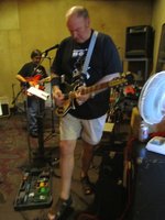 Gary in the background  and Rich in the foreground hitting the volume pedal for the Travelling Wilburys solo with the 660-12 on "Handle With Care"