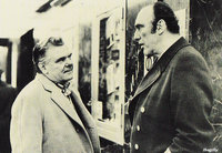 That's Bruno Koschmider on the left talking to his doorman. “Mach schau, mach schau!”