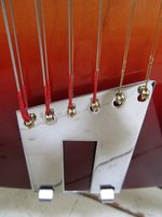 TI flats through the vintage-style flat tailpiece (BTW - I found it trickier to string up through this than the R-style tailpiece)