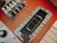 Chrome/plastic pickup cover REMOVED.  Treble Bezel (PickoftheRicks.com) and chrome pickup ring added.