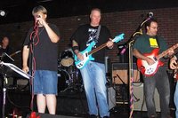 Dave O on far left, Scotty on lead vocals, Rich on the 480, Vito on FG 360 and the edge of Joey on the Ruby bass