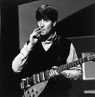 JOHN-LENNON-IN-REHEARSAL-1963-2-C24369F.jpg