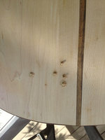 Knocked the plugs in and put a bit of sawdust around the top of the pin to (hopefully?) fill the edge chipping.