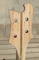 As did all the extra holes in the headstock.