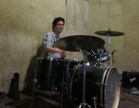 Harry sitting in on the drums for a spell