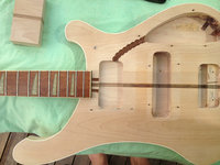 The new piece glued in.  Looks ok, except for the neck grain, lol...