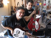 Gary and Paulie hold up the BurgundyGlo 460 and Paulie's newly acquired Ruby WB, (which is a Paul W  Jingle Jangle refinish) to show the difference in these two shades